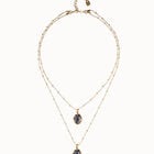 Multi strand necklace with two black oval faceted crystals
